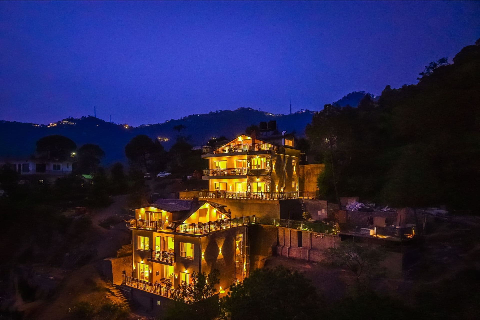 Konifer Wild Fern | Hilltop 2-BHK Retreat with Scenic Views, Shared Garden, Heated Pool & Outdoor Seating Space